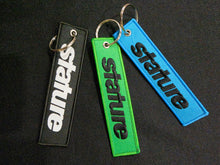 Load image into Gallery viewer, Stature Jet Tags